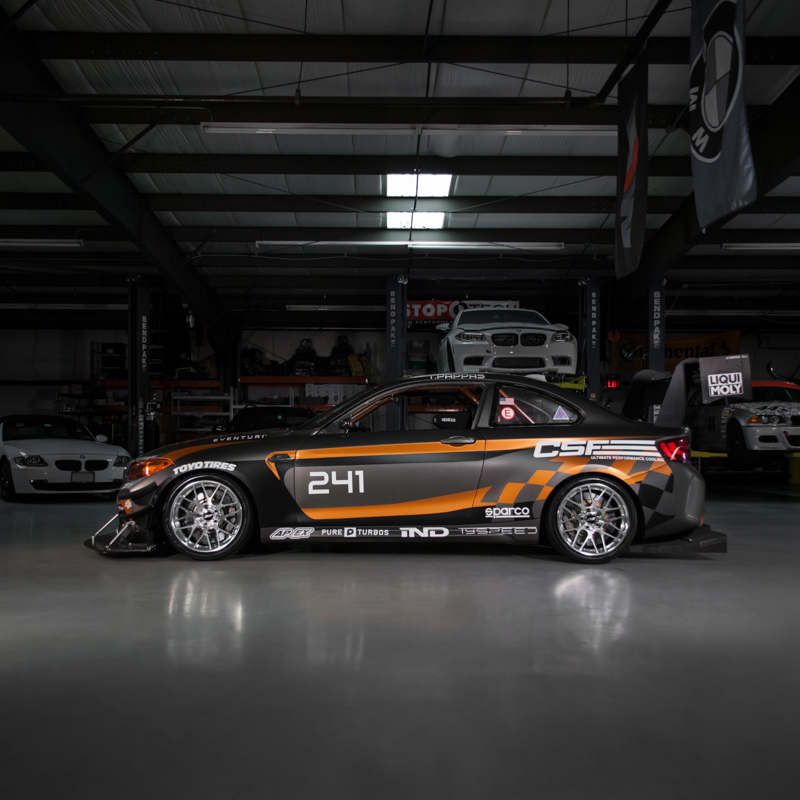 Automotive Photography Apex Race Wheels on Tyspeed BMW Racecar in Garage