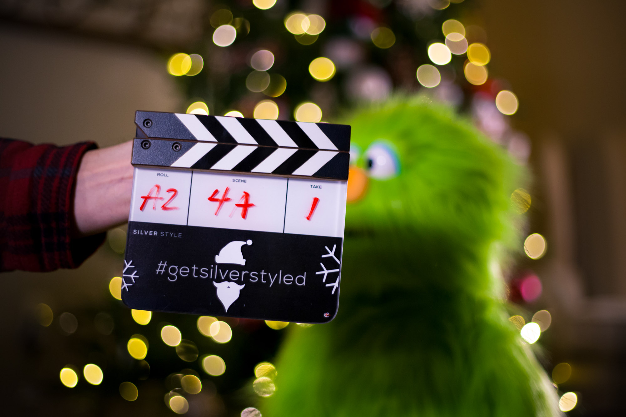 Film slate for Christmas film with green puppet.